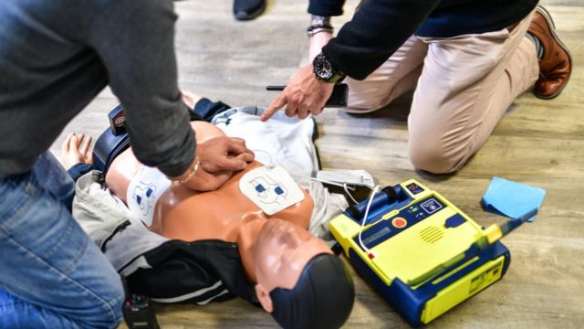 A CPR and defibrillator training session.