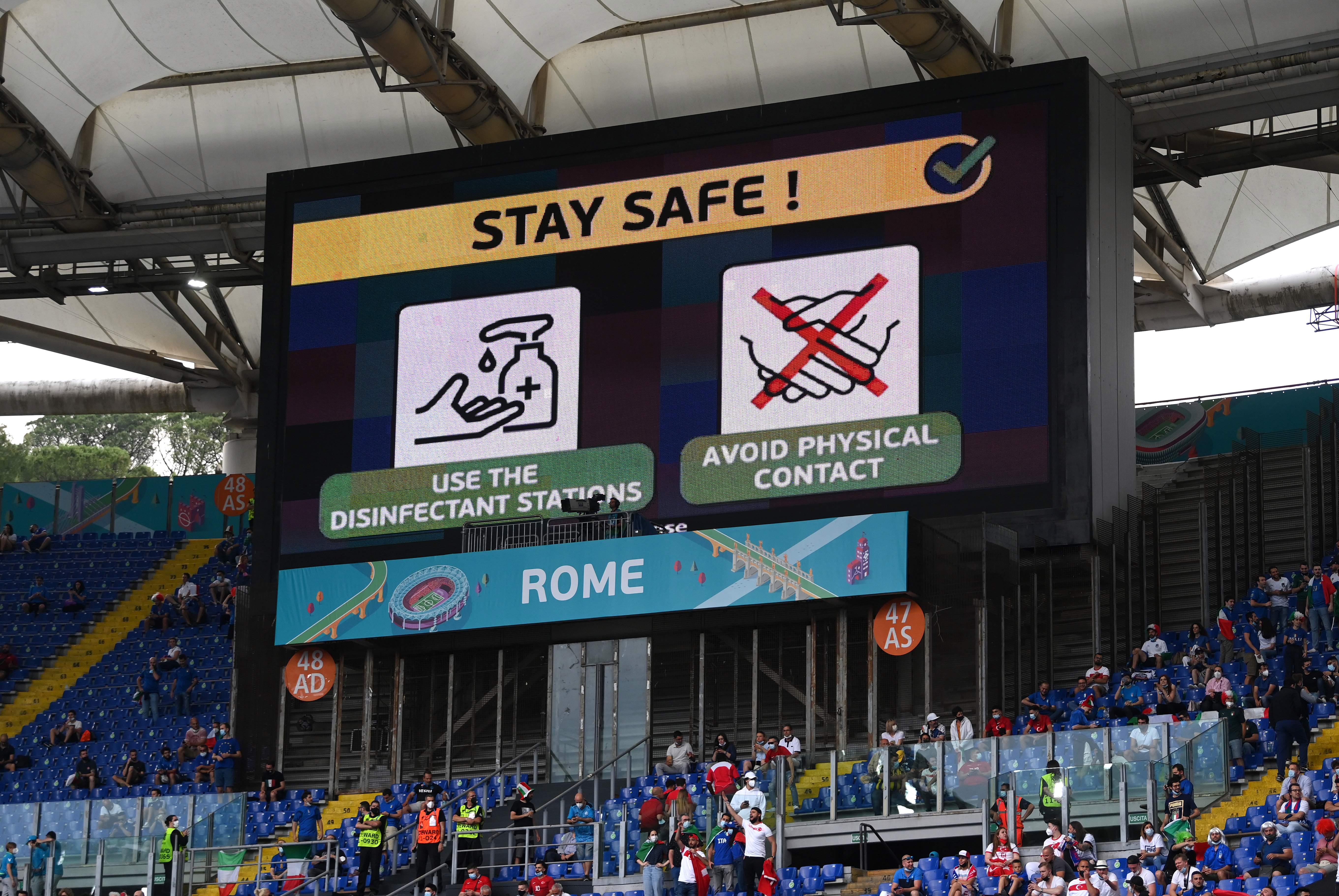 Covid-19 information is displayed on the LED board before the UEFA Euro 2020 Championship Group A match between Turkey and Italy at Stadio Olimpico
