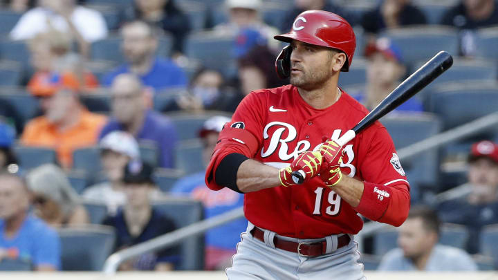 What is Joey Votto's millionaire contract like and how much does he have to collect with the Reds?