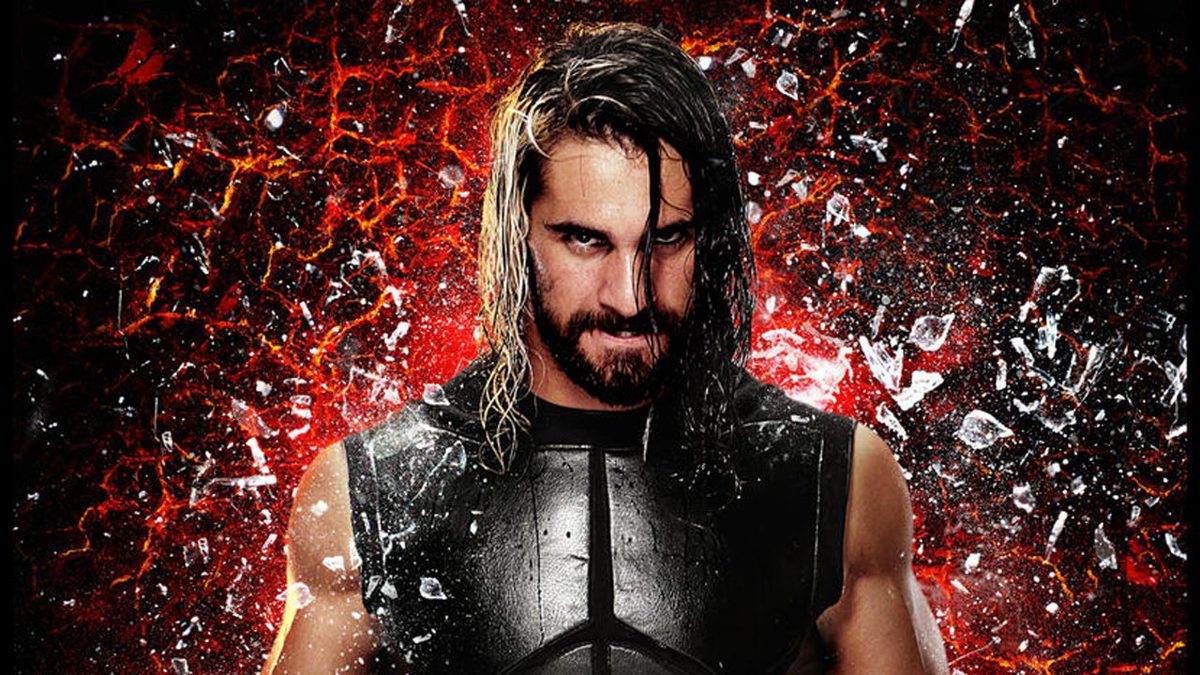 Seth Rollins is attacked by a fan during WWE Raw