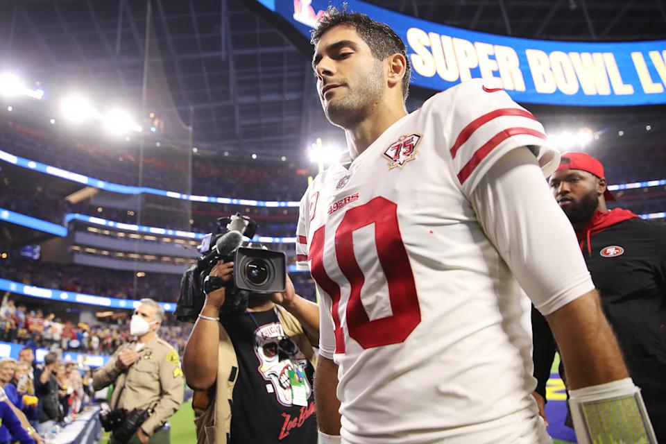 INGLEWOOD, CALIFORNIA - Jimmy Garoppolo #10 of the San Francisco 49ers walks off the field following their loss to the Los Angeles Rams in the NFC Championship game at SoFi Stadium on January 30, 2022 in Inglewood, California.  The Rams beat the 49ers 20-17.  (Photo by Christian Petersen/Getty Images)