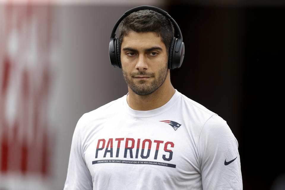 TAMPA, FL - New England Patriots quarterback Jimmy Garoppolo #10 walks onto the field for warm-ups with his headphones on prior to a game against the Tampa Bay Buccaneers at Raymond James Stadium on October 5, 2017 in Tampa, FL Florida.  (Photo by Don Juan Moore/Getty Images)