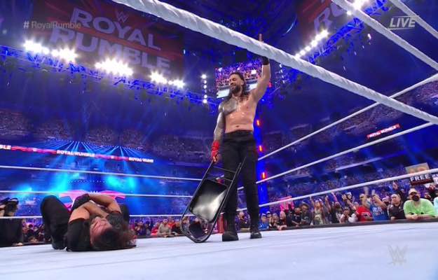 Roman Reigns retains the Universal Title by disqualification at WWE