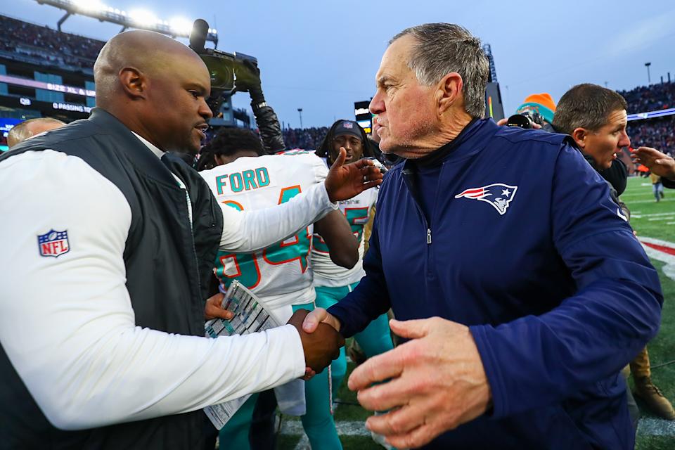 FOXBOROUGH, MA - Miami Dolphins coach Brian Flores greets New England Patriots coach Bill Belichick after the Dolphins won game at Gillette Stadium on December 29, 2019 in Foxborough, Massachusetts. (Photo by Adam Glanzman/Getty Images)
