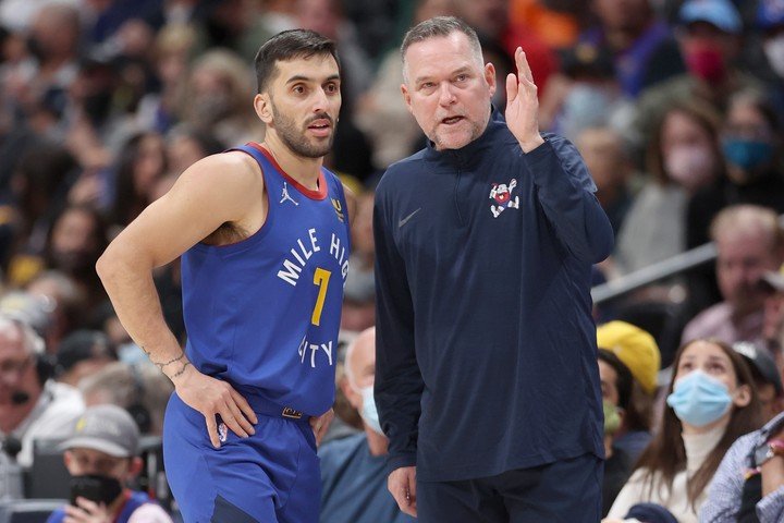 Malone, Facu's coach at the Nuggets. Matthew Stockman/Getty Images/AFP