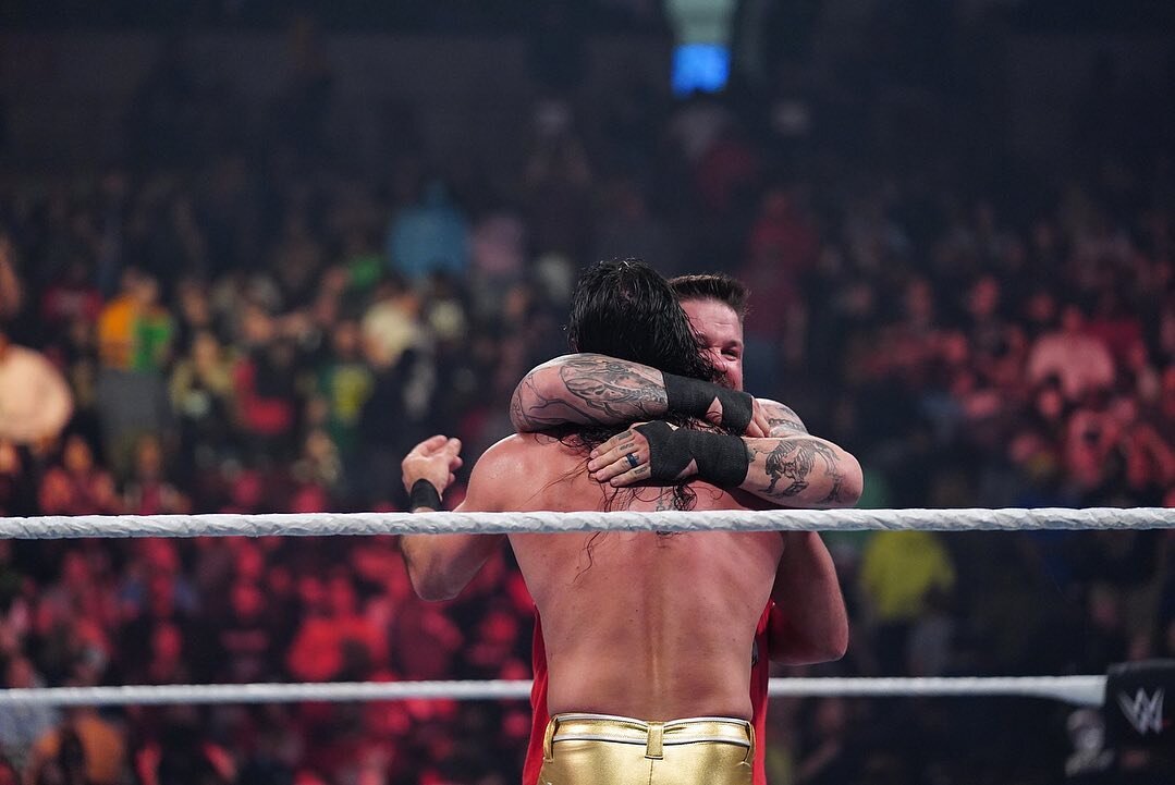 Kevin Owens and Seth Rollins hugging on WWE Raw