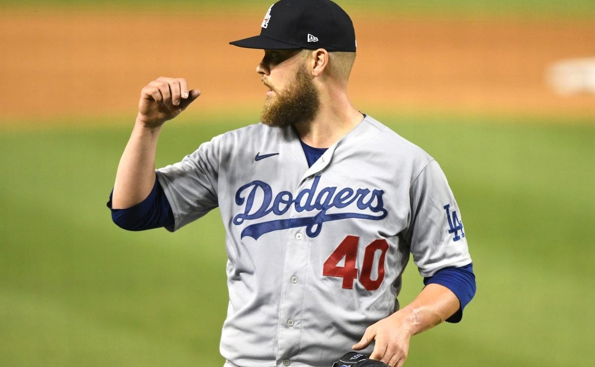 MLB Dodgers bring back reliever who likely wont pitch in