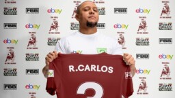 Roberto Carlos, Real Madrid legend, signed with a team from an English pub