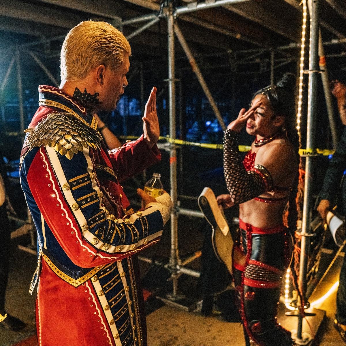 Cody Rhodes greeting Bianca Belair (new Raw Champion) before entering WrestleMania 38