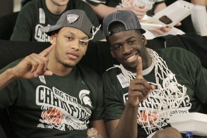 Payne and Diamond Green champions with Michigan in 2013.