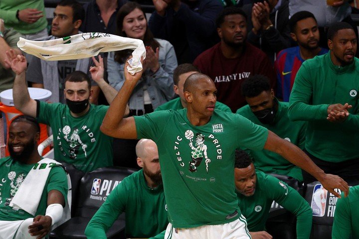 Al Horford and his celebration from the bank. (AFP)