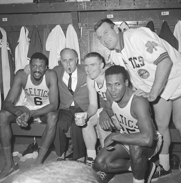 Russell (first from left) led his team in the 1950s and '60s. (AP)