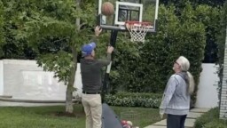 Happy and fit: Bruce Willis appears playing a basketball 'challenge' with friends