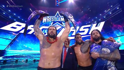 Roman Reigns Jey Uso and Jimmy Uso defeated Drew McIntyre