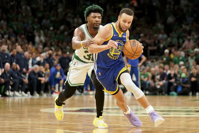 It's not all about throwing accuracy on Stephen Curry; the "prawns" and drives to the rim are another of his virtues, which he displays against Boston's Marcus Smart.
