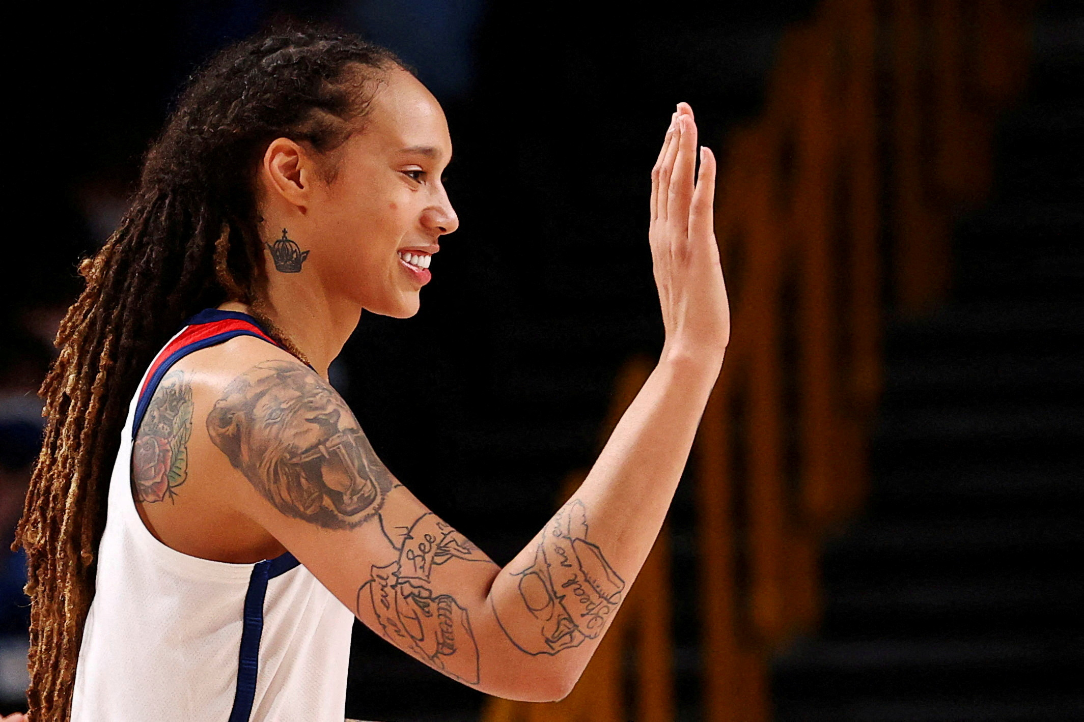 FILE PHOTO: Brittney Griner of the United States congratulates a teammate during their women's basketball gold medal match against Japan at the Tokyo 2020 Summer Olympics at the Saitama Super Arena in Saitama, Japan, on August 8, 2021. Photo taken on August 8, 2021. REUTERS/Brian Snyder