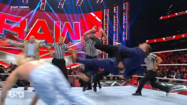 Bobby Lashley applying a spear in WWE Raw December 5, 2022