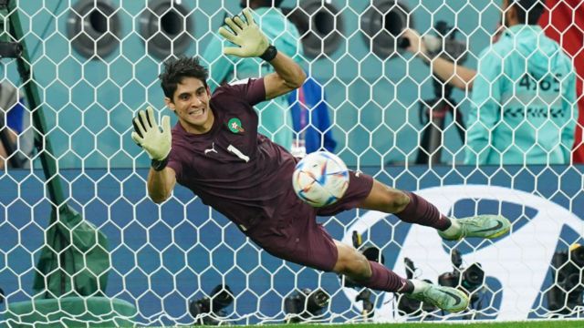 Yassine Bounou saves the third penalty kick during the FIFA World Cup Qatar 2022 round of 16 match between Morocco and Spain.